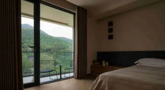 Кровать в общем номере с 3 комнатами Shanyueji MOONHILL Design Guesthouse