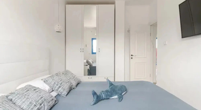 Семейные апартаменты с 2 комнатами с балконом и с видом на море Gugel Waves Apartments HaAliya 75
