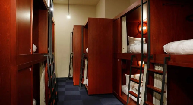Кровать в общем номере HakoBA Hakodate by THE SHARE HOTELS