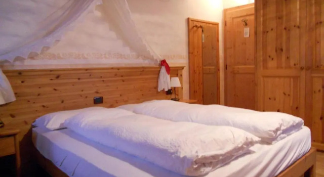Четырёхместный номер Standard Мансарда Hotel Garnì Salvanel