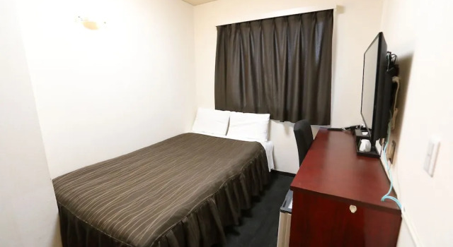 Номер Economy Osaka Corona Hotel
