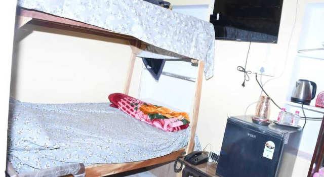 Кровать в общем номере Sarla Resort