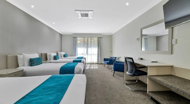 Семейный номер Deluxe Central Caleula Motor Lodge
