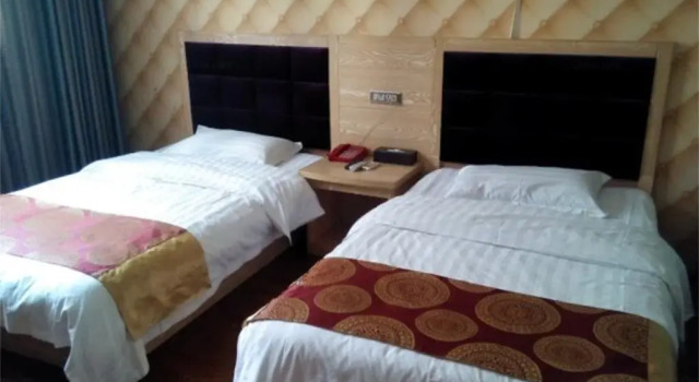 Tianmei Business Hotel, Prenota Hotel Hotel a Yingshan con parcheggio, Parcheggio