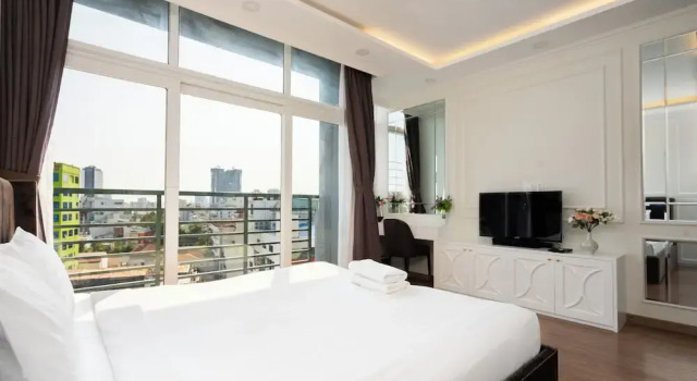 Апартаменты Deluxe с 3 комнатами с балконом и с видом на город Ben Thanh Tower - Luminous Apartments D1