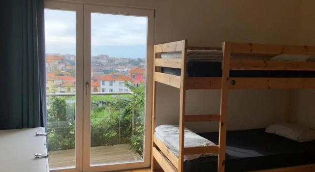 Кровать в общем номере Onefam Ribeira