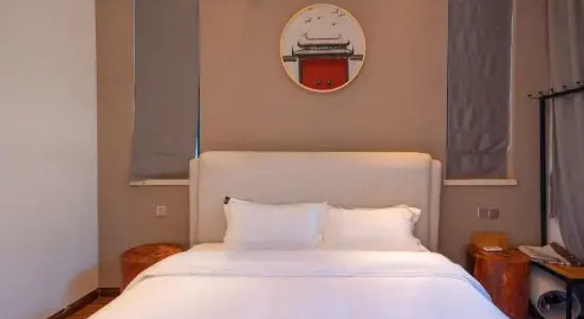 Кровать в общем номере Zhongyou Homestay