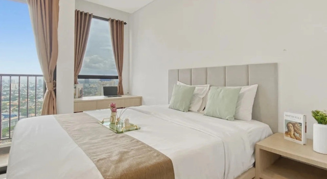 Homey Wooden Touch Studio At Apartment Ciputra World 2