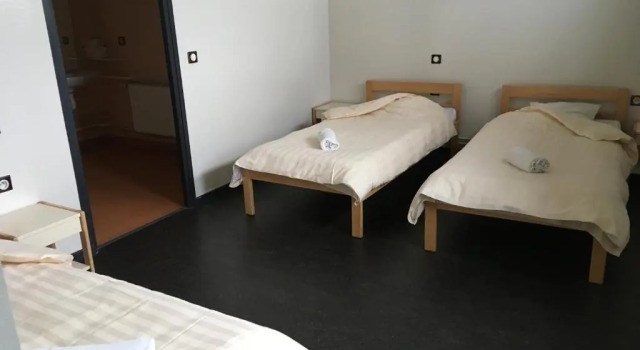 Кровать в общем номере Auberge de jeunesse LEscale