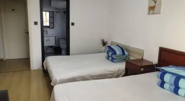 Кровать в общем номере Instant Friendship Homestay (Shanxi Cancer Hospital)