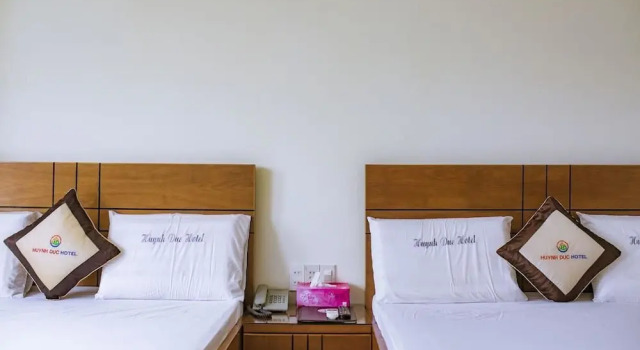 Четырёхместный номер Deluxe Huynh Duc Hotel
