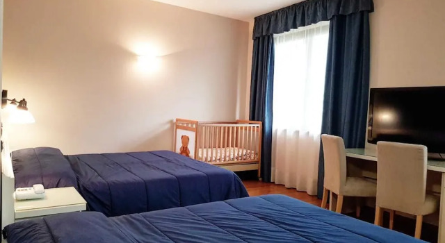 Четырёхместный номер Standard Il Grifo Hotel e Bisteccheria Toscana