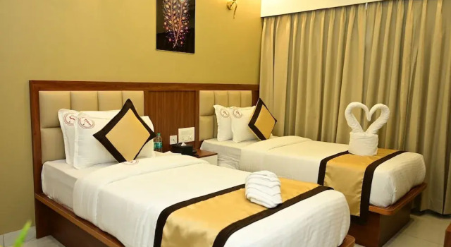 Aanvi Suites RR nagar, Забронировать Отель Отели штата Карнатаки с парковкой, Парковка