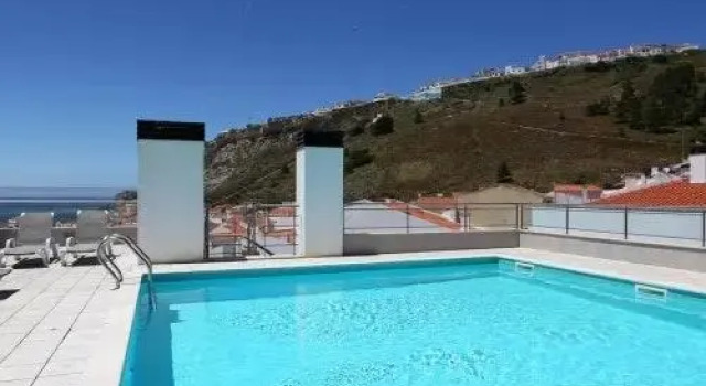 ALTIDO Nazare 3-BR Flat w/Terrace & Rooftop Pool, Забронировать Отель Отели Назаре 4 звезды, рядом с Арена Праса де Торос, 4*