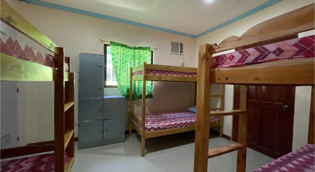 Кровать в общем номере OYO 795 Tapales Guest House