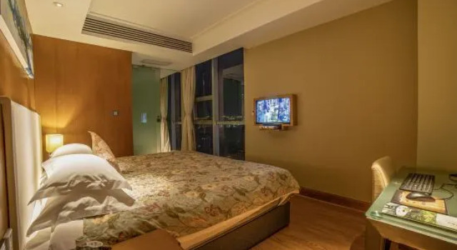 Obchodní Apartmá Tang's Hotel