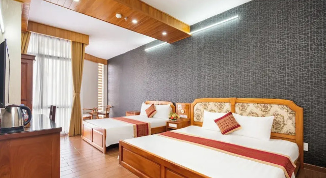 Четырёхместный семейный номер Standard Sai Gon Airport Hotel