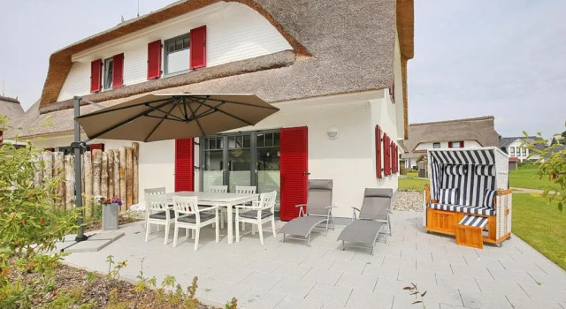 Коттедж Reethaus Am Mariannenweg 02a