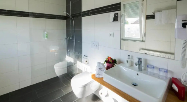Апартаменты Hotel Löwen Garni - B&B