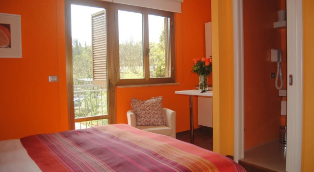 Апартаменты с 2 комнатами с балконом Bedroom La Stazione