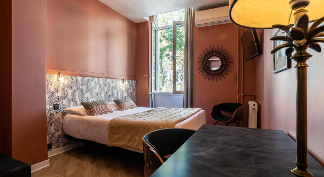 Кровать в общем номере Boutique Hôtel Azur