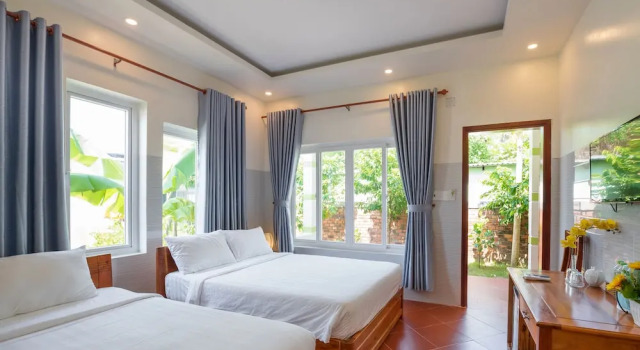 Семейное бунгало с балконом и с видом на сад Trung Huynh Bungalow