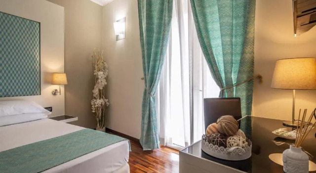 Четырёхместный номер Standard Merulana Inn Guest House