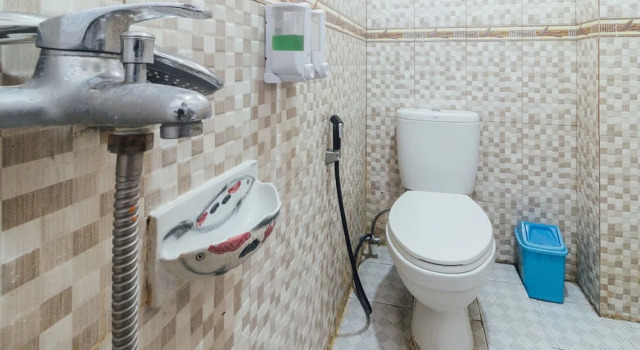Номер Deluxe OYO 2010 Satria Guest House