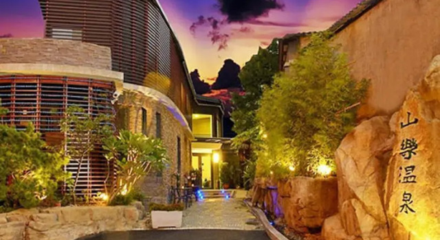Кровать в общем номере Shan-Yue Hotspring Hotel