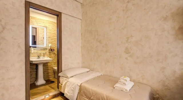Номер Deluxe AMICI GUESTHOUSE