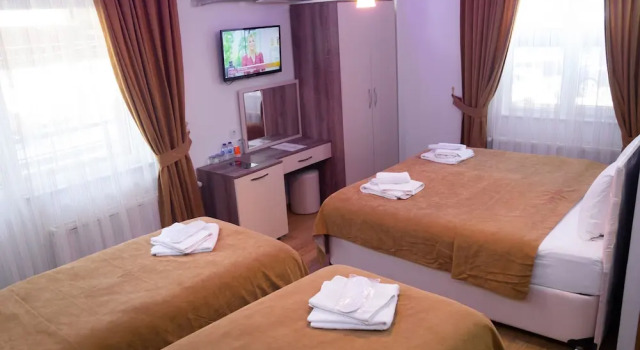 Четырёхместный номер Standard с балконом Figen Hotel