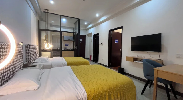 Номер Deluxe Yi Long International Apartment
