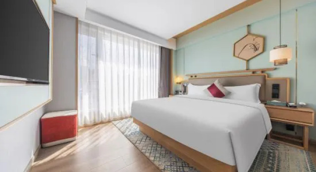 Люкс с 2 комнатами Kunming Guandu Muyunpan Garden Resort Hotel (Hai Le World Shijicheng Changhong West Road Branch)
