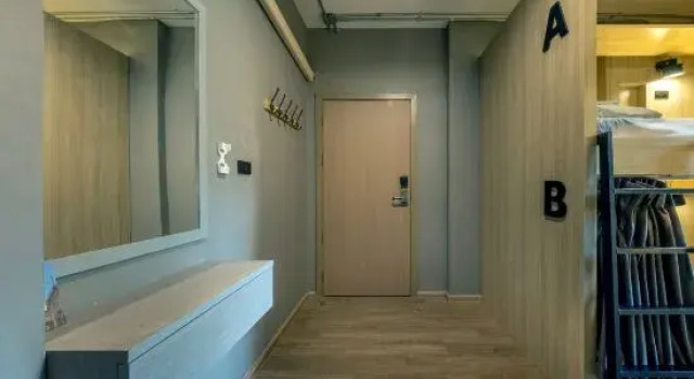 Кровать в общем номере Changsha Hongwang Guest House