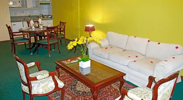 Кровать в общем номере Yotau All Suites Hotel