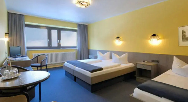 Standard triplă cameră Raststättenhotel Grunewald