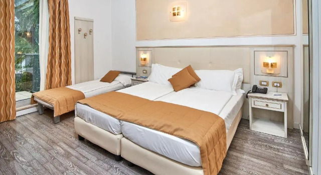 Трёхместный номер Standard с видом на сад Hotel Lido Blu - Surf & Bike