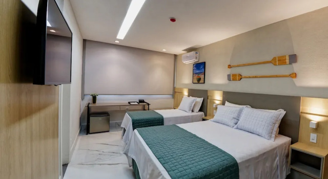 Кровать в общем номере Gaeta Hotel