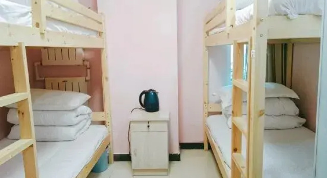 Кровать в общем номере Tianjin Xinsentang International Youth Hostel
