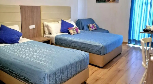 Четырёхместный номер Comfort с балконом и с видом на бассейн Fitosinn Hotel