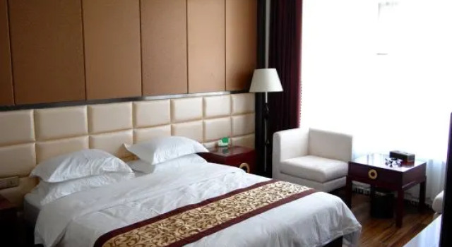 Семейный люкс Caoyuan Xiongfeng Business Hotel