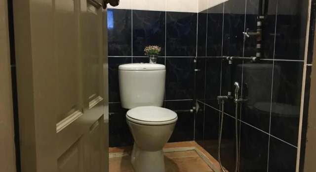 Кровать в общем номере Check In Lodge