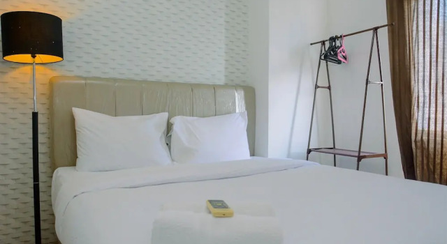 Номер Standard Spacious and Comfortable 2BR Green Bay Pluit Apartment