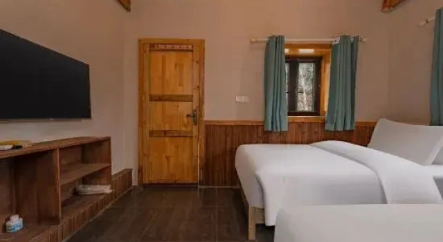 Кровать в общем номере Wudangshan Shanli Hanshe Homestay