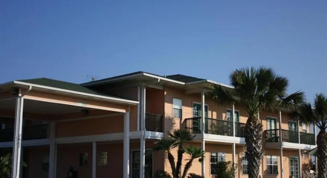 Кровать в общем номере The Island Hotel Near Beach Port Aransas