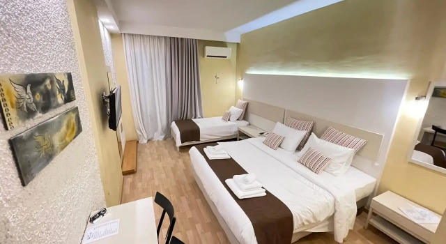 Трёхместный номер с видом на сад Nidimos Hotel