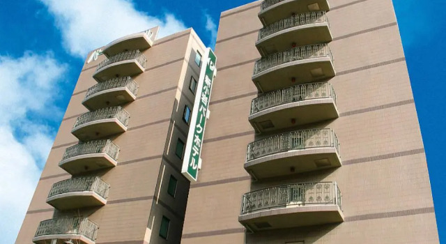 Кровать в общем номере Smile Hotel Tokyo Shinkoiwa