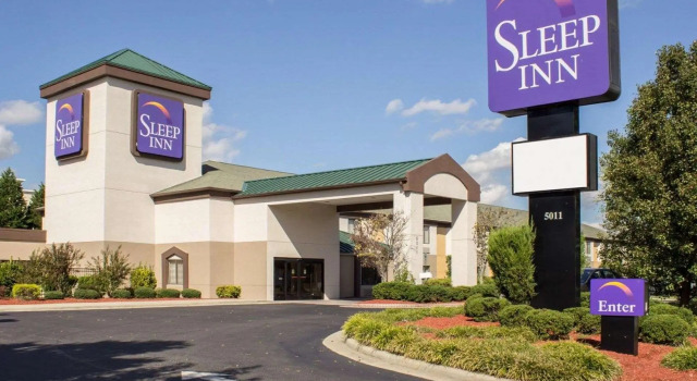 Кровать в общем номере Sleep Inn Wilson near I-95