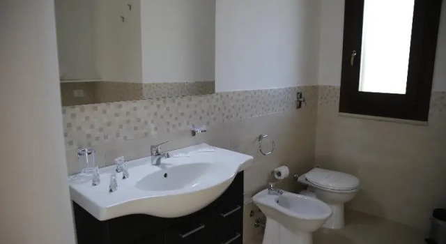 2 soveværelser i Deluxe lejlighed med altan Oasi Guzzetta Aparthotel Residence