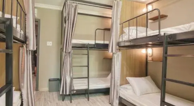 Кровать в общем номере Triple Hostel